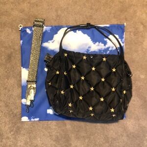 Black and Gold Quilted Shoulder Bag with Star Accents